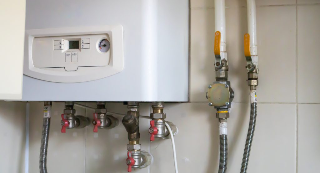 water heater failing signs including rust, leaks, and maintenance inspection