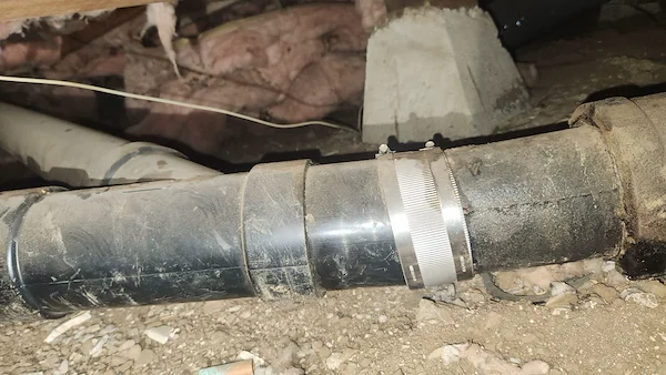 Replacing old drain piping in a Los Altos crawlspace.