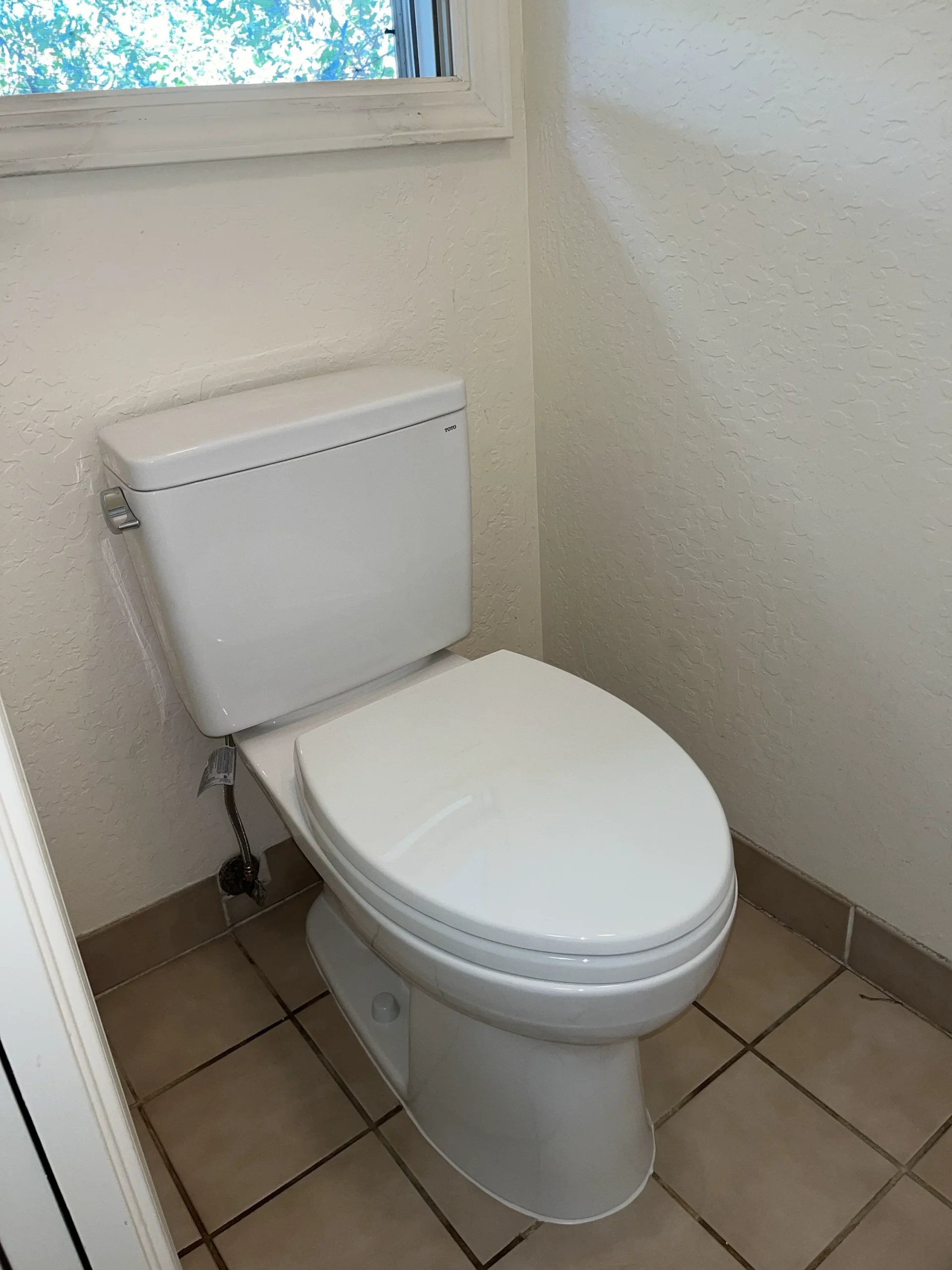 A new toilet set and sealed in a Monte Sereno bathroom.