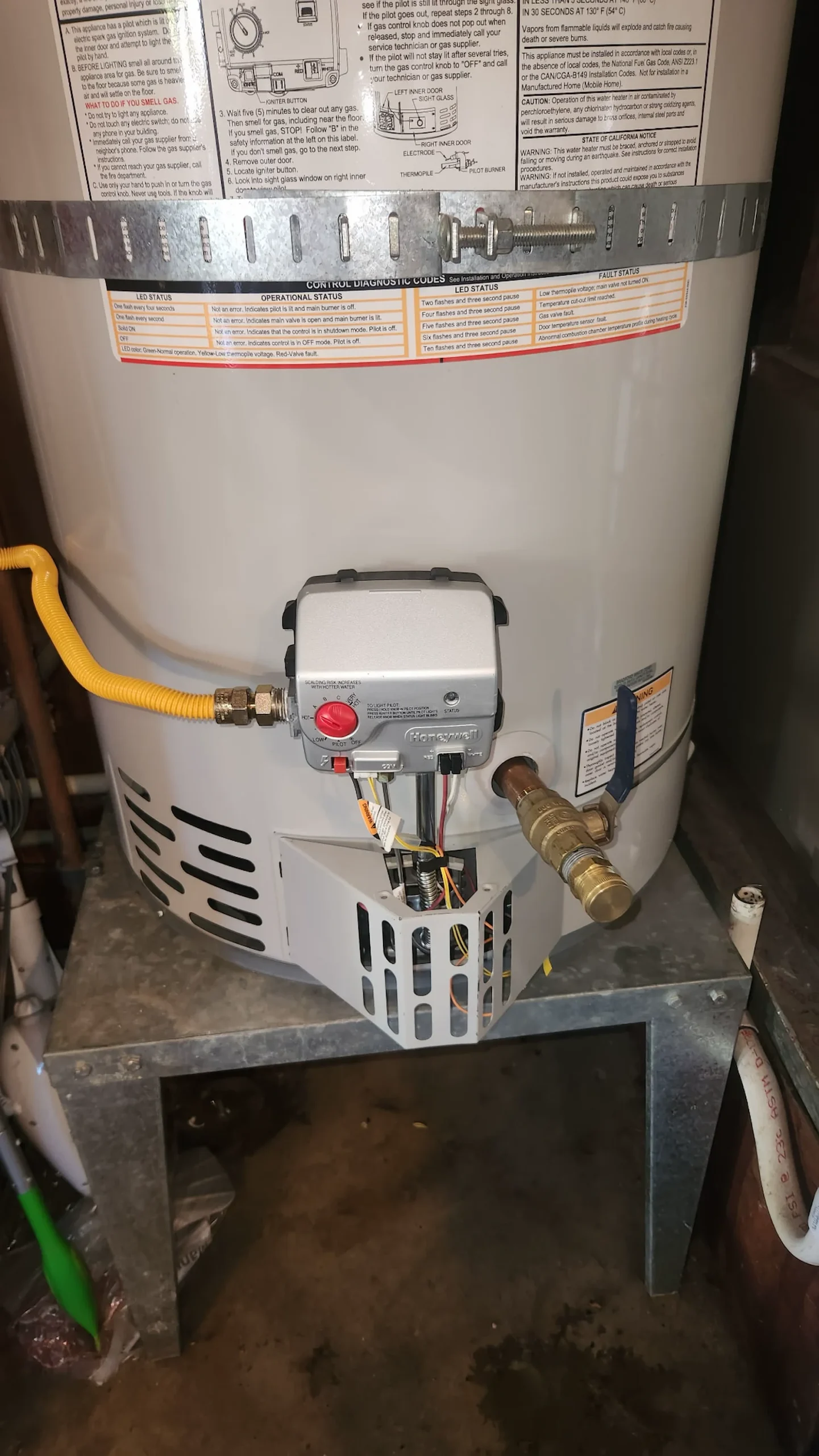 Simply Green Plumbing servicing a water heater at a Saratoga, California home