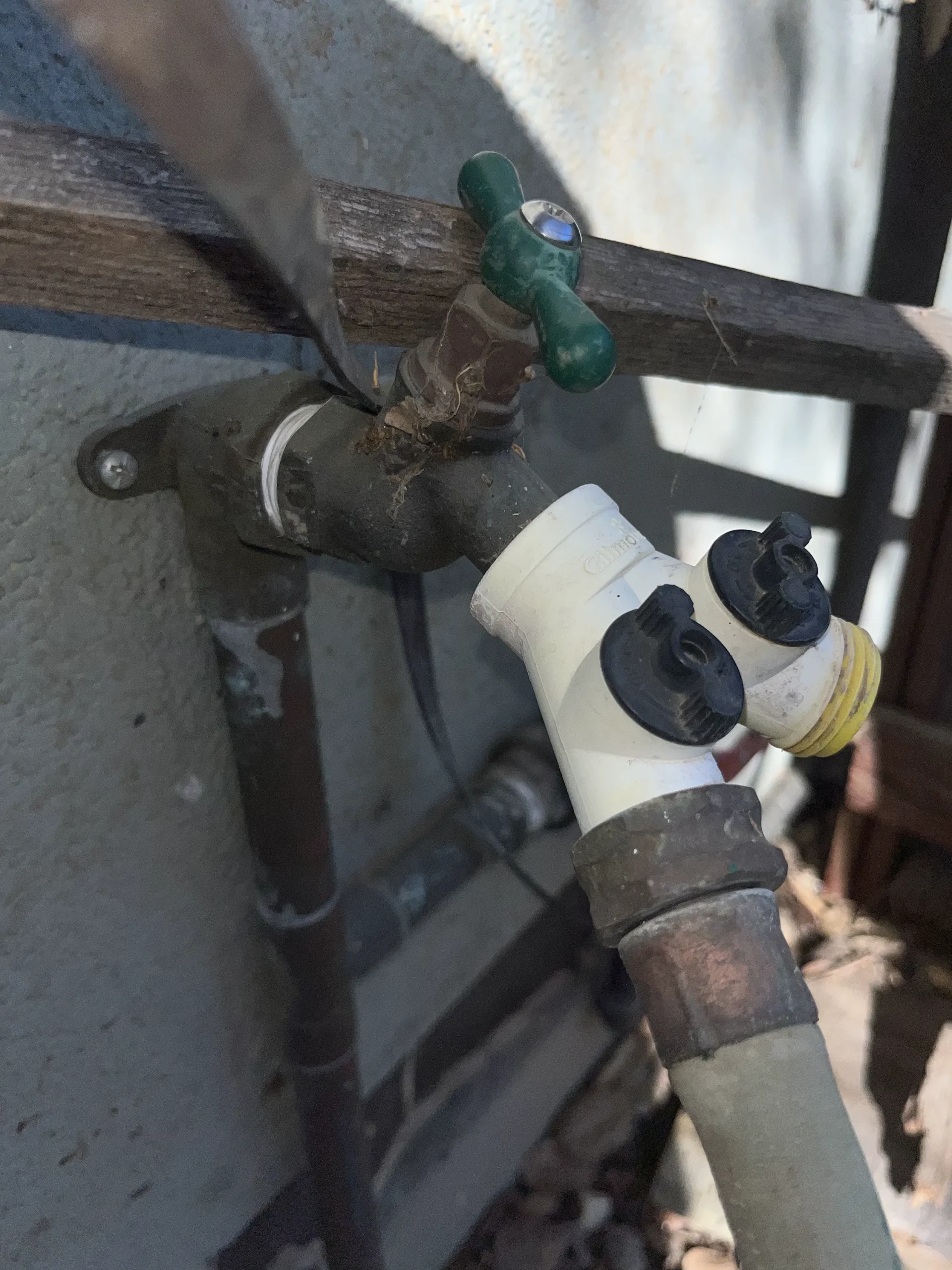 Outdoor faucet rebuilt with a new vacuum breaker by Simply Green Plumbing