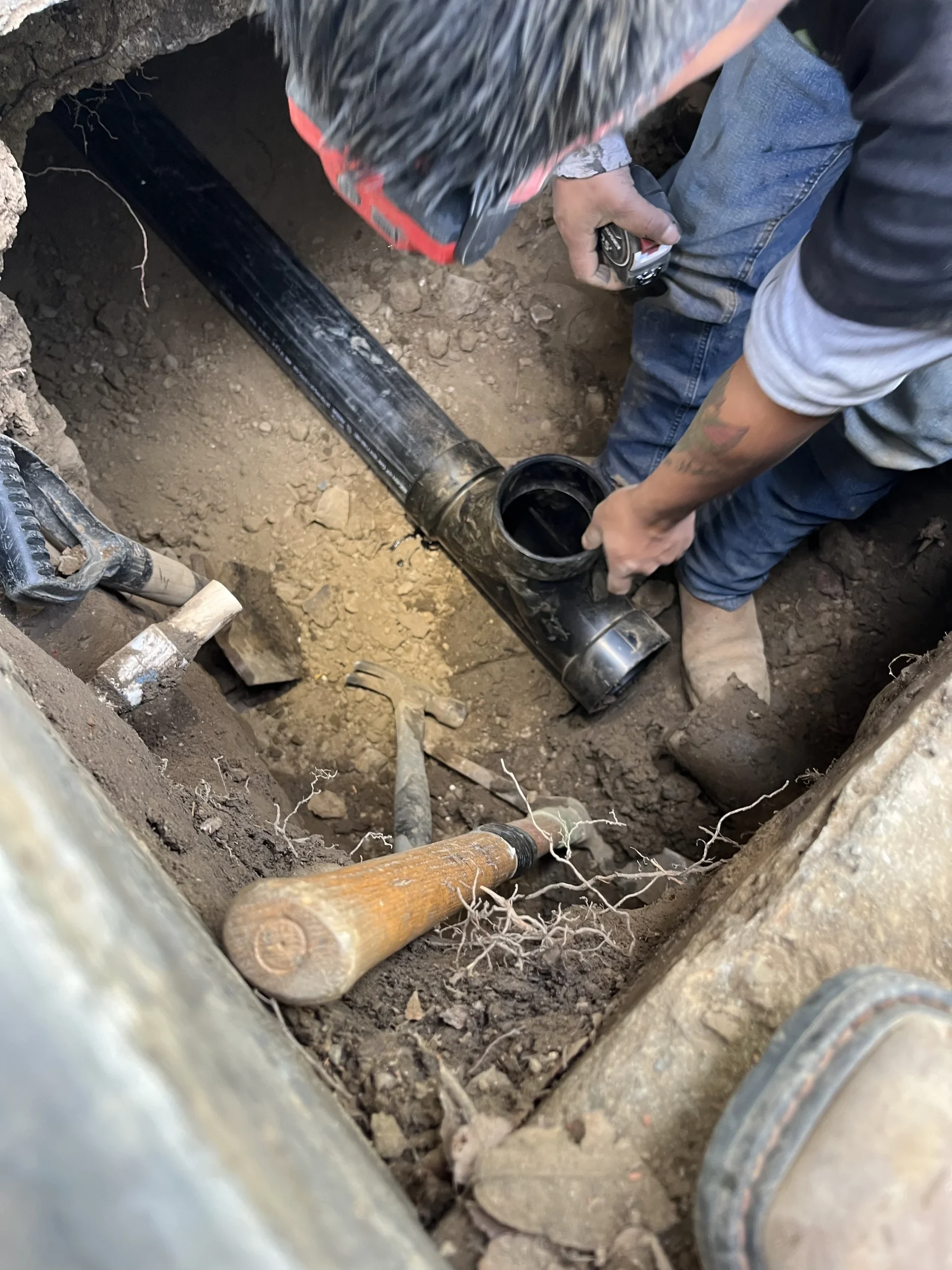 Simply Green Plumbing crew replacing a section of sewer line at a Campbell, California home